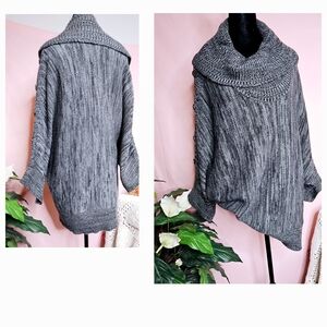 Gray oversized New Direction sweater, embellished with buttons, size X1.